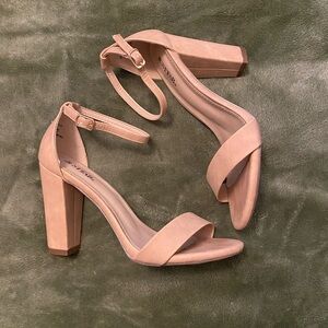 Nude sandal heel.